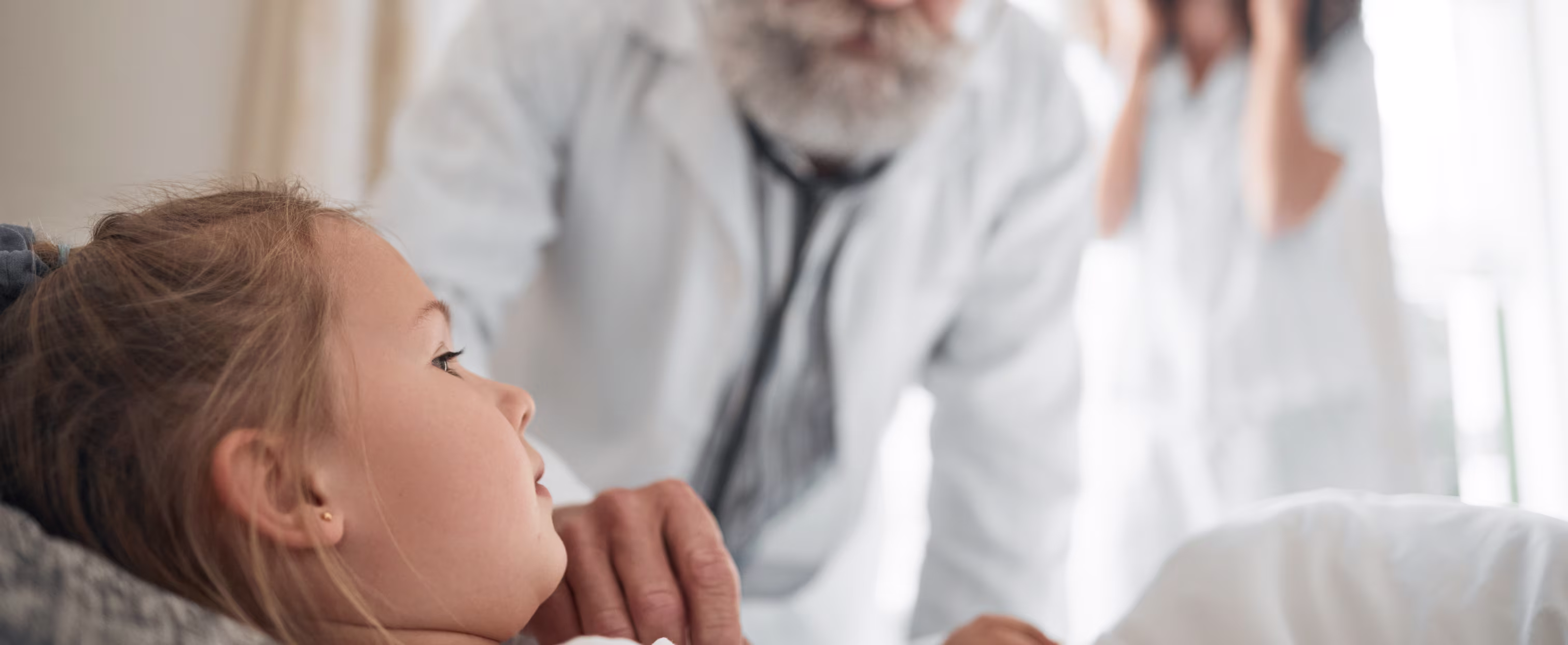 A child being cared for by a doctor
